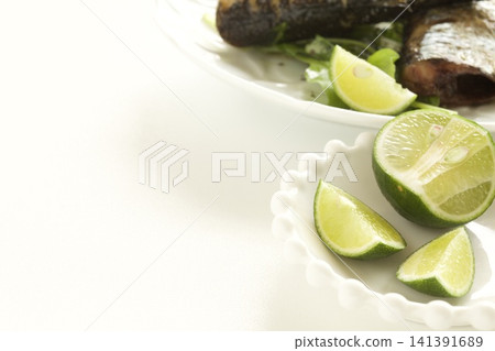 Grilled fish and sudachi (Japanese citrus fruit) Grilled fish and sudachi (Japanese citrus fruit) 141391689