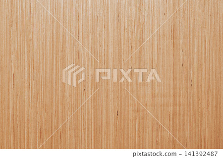 Horizontal close up overhead view of a smooth light brown plywood board texture with straight natural wooden grain lines for construction background design Horizontal close up overhead view of a smooth light brown plywood board texture with straight natural wooden grain lines for construction background design 141392487