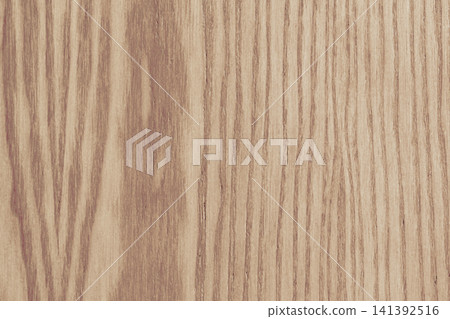 Horizontal close up overhead view of a light brown wood texture with natural oak grain patterns and vertical timber lines for minimalist background design Horizontal close up overhead view of a light brown wood texture with natural oak grain patterns and vertical timber lines for minimalist background design 141392516