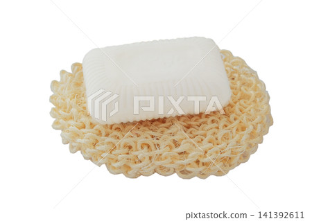 Care and hygiene. Top view. Washcloth and soap isolated on white background. Wash and cleaning. Care and hygiene. Top view. Washcloth and soap isolated on white background. Wash and cleaning. 141392611