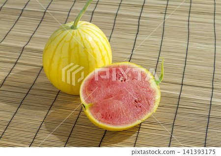 "Kinpuku Watermelon," a specialty of Fukui Prefecture, is a brand of watermelon with a yellow rind and vibrant red flesh. "Kinpuku Watermelon," a specialty of Fukui Prefecture, is a brand of watermelon with a yellow rind and vibrant red flesh. 141393175