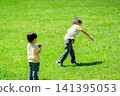 Brothers playing in the park 141395053