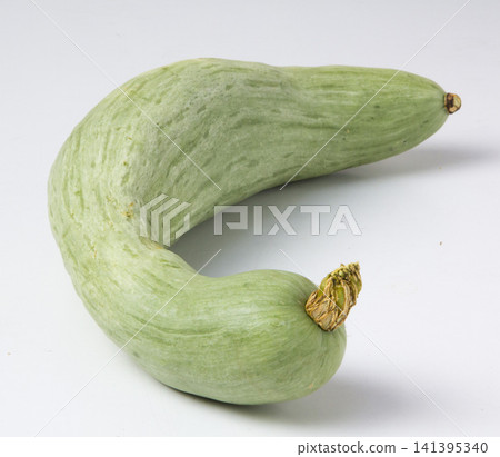 A collection of various pumpkin varieties photographed against a white background. A collection of various pumpkin varieties photographed against a white background. 141395340