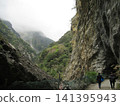 The scenery of the cloud-covered mountains and the White Yang Trail in Taroko Gorge, Taiwan. 141395943