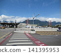 Hualien Station and the distant mountain range shrouded in clouds. 141395953