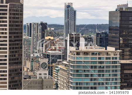 Modern architecture high-rise buildings cityscape Vancouver Canada. Travel photo, editorial-July 10,2022 Modern architecture high-rise buildings cityscape Vancouver Canada. Travel photo, editorial-July 10,2022 141395970