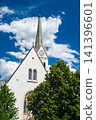 St. Martin Parish Church in Bled, Slovenia, a Neo-Gothic landmark built between 1903 and 1905 near Lake Bled, featuring a tall bell tower and historic architectural details. 141396601