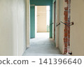 Exposed electrical cables in unfinished residential drywall wall 141396640