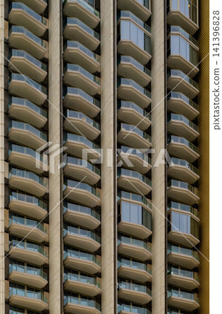 Modern High-Rise Building with Repetitive Balcony Design Modern High-Rise Building with Repetitive Balcony Design 141396828