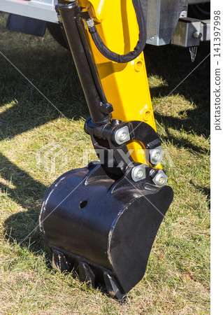 Shovel of excavator or bulldozer. Part of industrial machinery. Technology Shovel of excavator or bulldozer. Part of industrial machinery. Technology 141397998