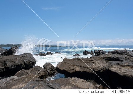 Waves crashing against the rocky shore of Jogashima Island in Miura City, Kanagawa Prefecture. Waves crashing against the rocky shore of Jogashima Island in Miura City, Kanagawa Prefecture. 141398649