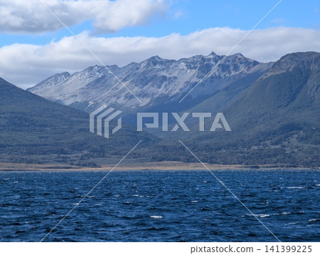Ushuaia, Argentina - March 6, 2026: Detailed View of Rugged Mountains Across the Beagle Channel 141399225