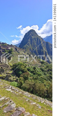The stone terraces of Machu Picchu and the majestic peak of Huayna Picchu, Peru The stone terraces of Machu Picchu and the majestic peak of Huayna Picchu, Peru 141399601