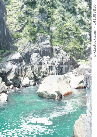 Rocky coastline and the blue sea Rocky coastline and the blue sea 141399810