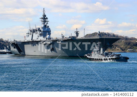 At the naval port of Yokosuka... The destroyer Izumo departs the dock. At the naval port of Yokosuka... The destroyer Izumo departs the dock. 141400112