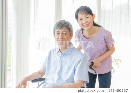 Senior couple providing home care Senior couple providing home care 141400367