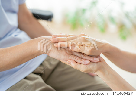 senior hand holding hands senior hand holding hands 141400427