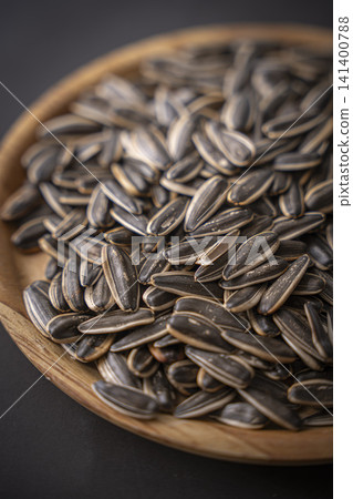 Sunflower seeds are a delicious snack. Sunflower seeds are a delicious snack. 141400788