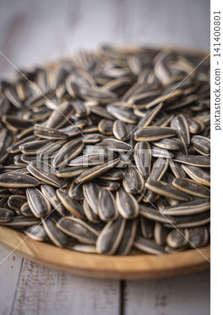 Sunflower seeds are a delicious snack. Sunflower seeds are a delicious snack. 141400801