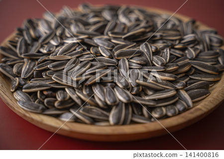 Sunflower seeds are a delicious snack. Sunflower seeds are a delicious snack. 141400816
