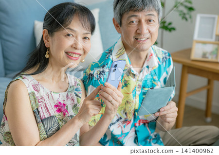 Senior couple planning a trip Senior couple planning a trip 141400962