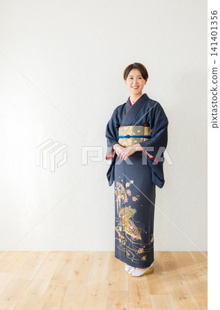 A woman in a kimono A woman in a kimono 141401356