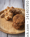 Fried food on a plate: Fried chicken and croquettes 141401950