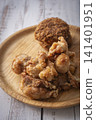 Fried food on a plate: Fried chicken and croquettes 141401951