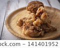 Fried food on a plate: Fried chicken and croquettes 141401952
