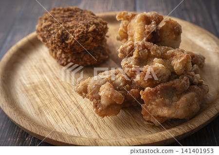 Fried food on a plate: Fried chicken and croquettes Fried food on a plate: Fried chicken and croquettes 141401953