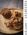 Fried food on a plate: Fried chicken and croquettes 141401954
