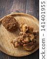 Fried food on a plate: Fried chicken and croquettes 141401955
