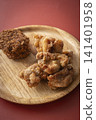 Fried food on a plate: Fried chicken and croquettes 141401958