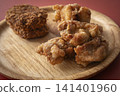 Fried food on a plate: Fried chicken and croquettes 141401960