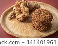 Fried food on a plate: Fried chicken and croquettes 141401961