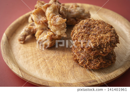 Fried food on a plate: Fried chicken and croquettes Fried food on a plate: Fried chicken and croquettes 141401961