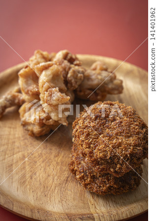 Fried food on a plate: Fried chicken and croquettes Fried food on a plate: Fried chicken and croquettes 141401962