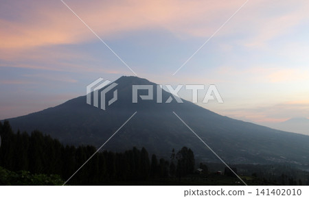 A peaceful mountain peak at gentle twilight. A peaceful mountain peak at gentle twilight. 141402010