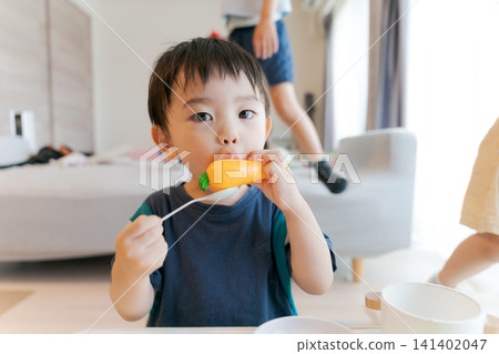 Children playing in the living room Children playing in the living room 141402047