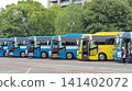 Large bus parked in the parking lot 141402072