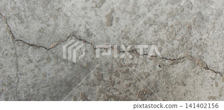 Cracked gray concrete surface texture Cracked gray concrete surface texture 141402156
