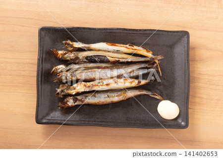 Capelin (smelt) with roe, grilled. Capelin (smelt) with roe, grilled. 141402653