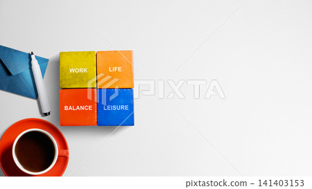 Top view of colorful wooden blocks with words Work, Life, Balance, and Leisure next to a coffee cup and envelope on a white background with copy space Top view of colorful wooden blocks with words Work, Life, Balance, and Leisure next to a coffee cup and envelope on a white background with copy space 141403153