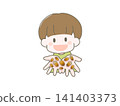 A boy with lots of acorns 141403373
