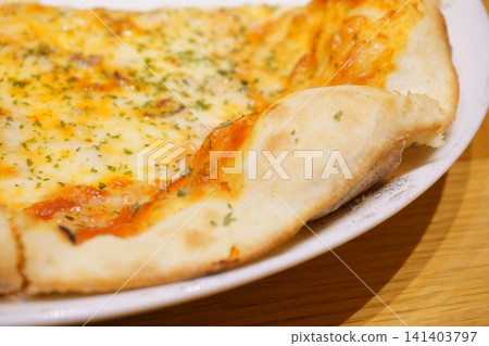 Pizza with a fluffy crust. Pizza with a fluffy crust. 141403797