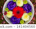 A pot of flowers placed in the garden of a temple in Kyoto 141404560
