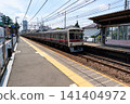 Waiting for a train on the platform at Shibasaki Station on the Keio Line, Kikunodai, Chofu City, Tokyo 141404972