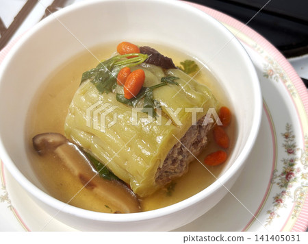 Healthy Thai stuffed bitter gourd soup with minced pork, shiitake mushroom Healthy Thai stuffed bitter gourd soup with minced pork, shiitake mushroom 141405031