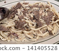 Pasta with rich cream sauce and truffles 141405528