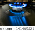 Blue Gas Flame Burning on Kitchen Stove Close Up 141405821